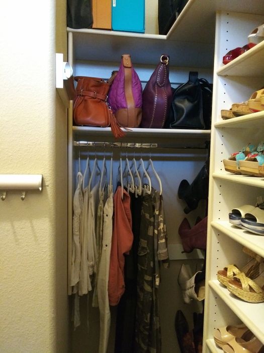 Her walk-in closet — organized right after the build