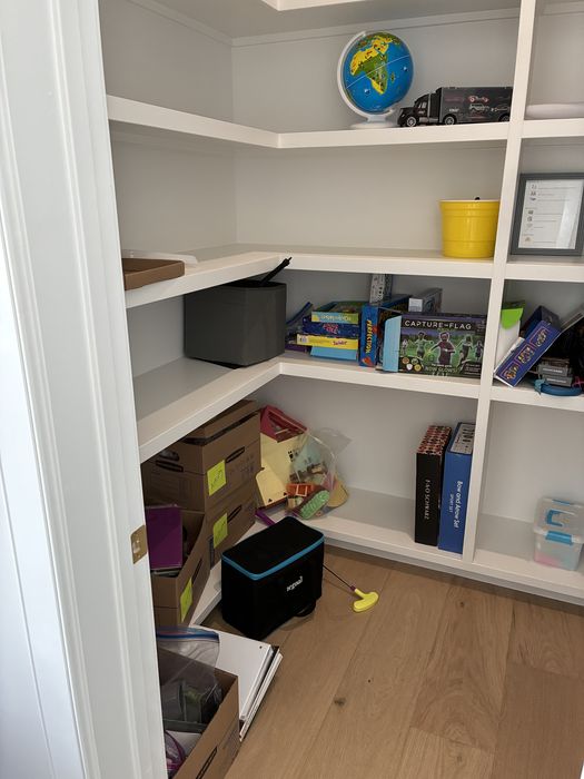 Kids' playroom closet — before